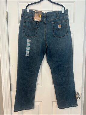 Carhartt Men's Relaxed Fit Jeans in Medium Dark Blue. NWT 38x30